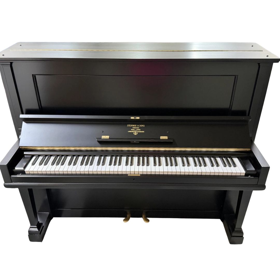 Front view of the restored Steinway upright with keys exposed