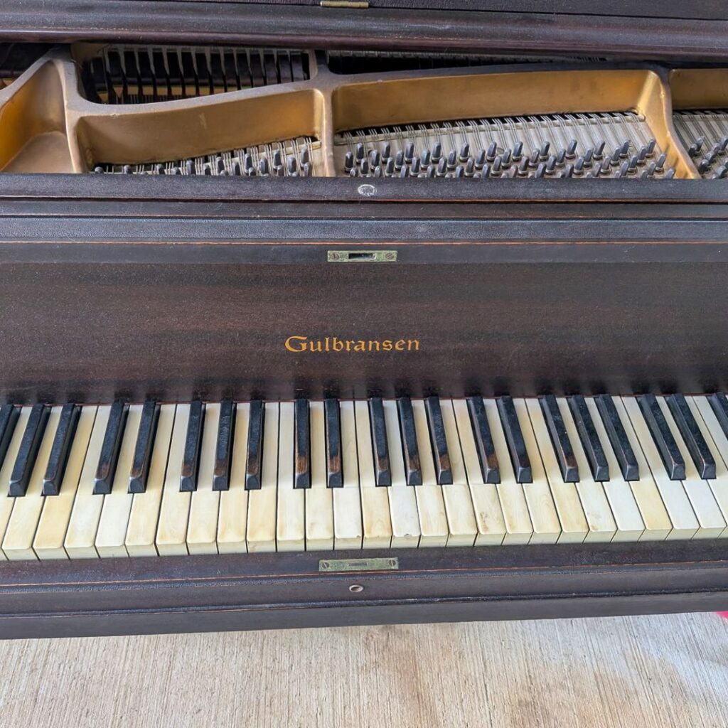 Further detail of the baby grand, current condition